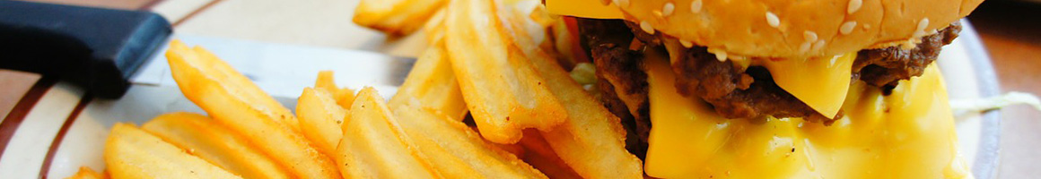 Eating Burger at Mac's Drive Thru restaurant in Gainesville, FL.